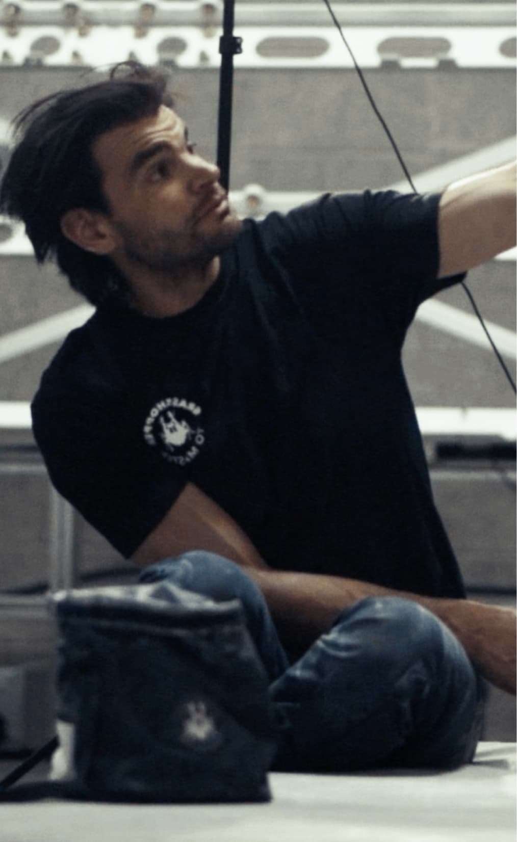 An athlete chalking up between attempts
