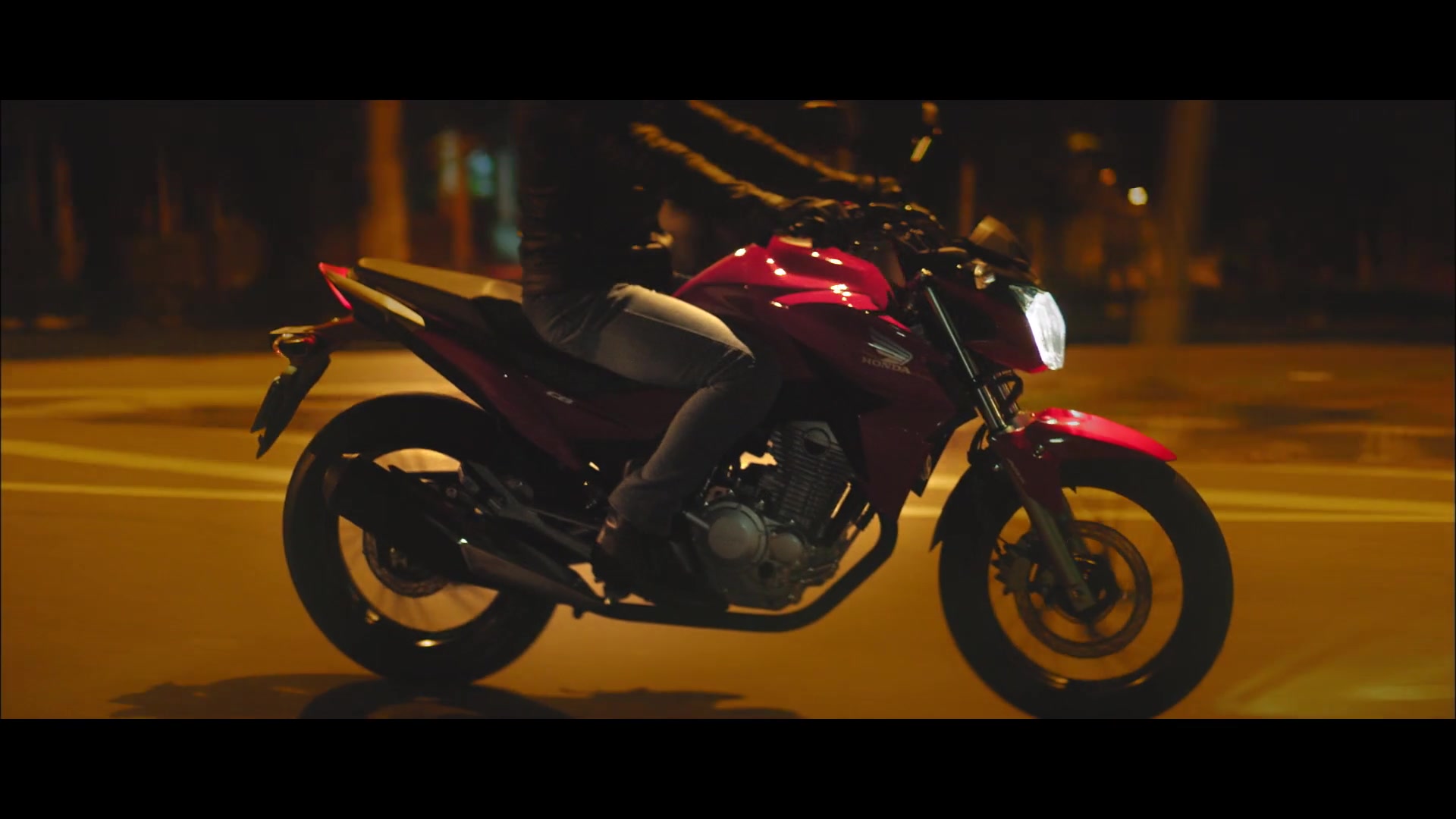 The red Honda CB at night