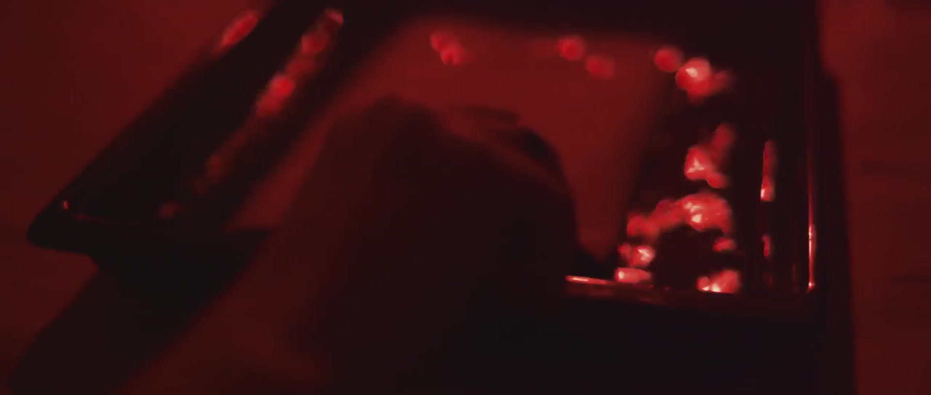 The red glow of the darkroom