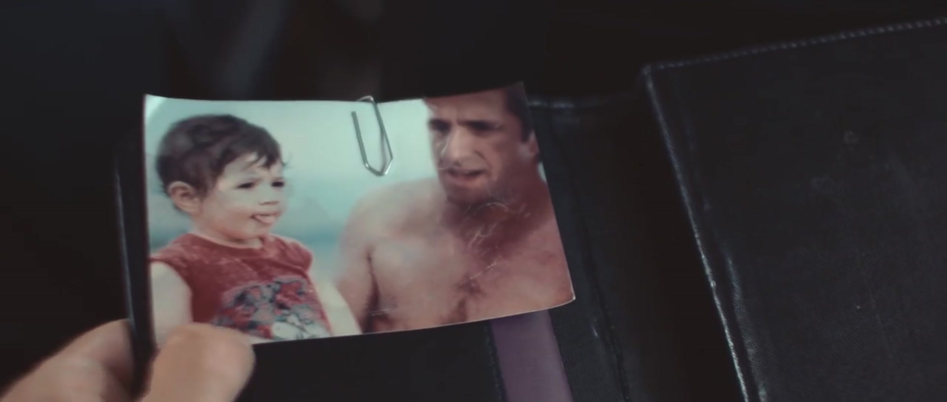 A photograph of a father and his son